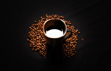 Cup of coffee on a black background