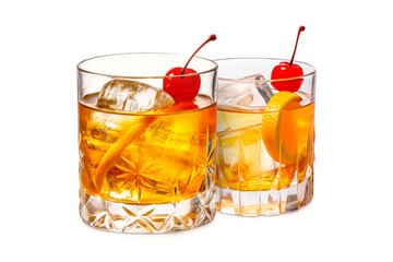 Set of classic Old Fashioned cocktails in a crystal-cut rocks glass isolated on white backdrop