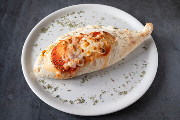 pizza calzone, typical dish of Italian cuisine