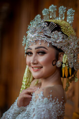 Amazing smiling bride. Traditional Javanese Bridal Portrait. Indonesian bride. Wedding day bride in wedding dress. Beautiful bride. Beautiful model. Javanese wedding dress. Akad Nikah Dress.