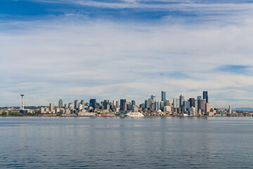 Waterfront Seattle skyline with Great wheel view. Skyscrapers of financial downtown at day time,...