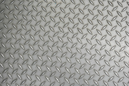 Industrial shiny metal silver list with rhombus shapes as design background