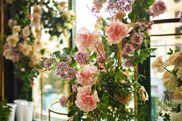 wedding arch of peonies and roses without people. Modern wedding decoration
