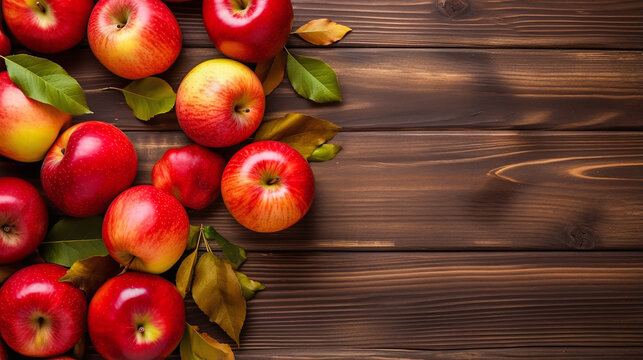 fresh red apples on an wooden ground
