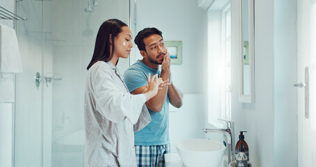 Couple, bathroom and cleaning face with cream, skincare and comic joke with laughing, serum or...