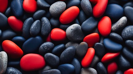 Red and blue pebbles background. Smooth stones texture.