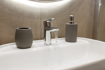 Fototapeta premium Modern faucet bathroom interior.