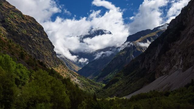 Ecrins National Park mountains with passing clouds (time-lapse) with Pic Jocelme. Valgaudemar Valley in Hautes-Alpes, French Alps, France