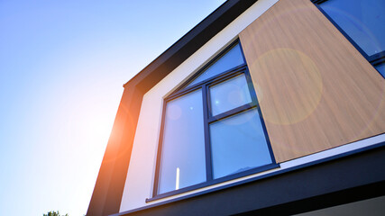 New build single family house. Suburban area with modern geometric family house.