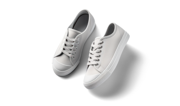 white canvas sneakers, png file of isolated cutout object with shadow on transparent background.
