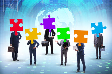 Concept of business people and jigsaw puzzle
