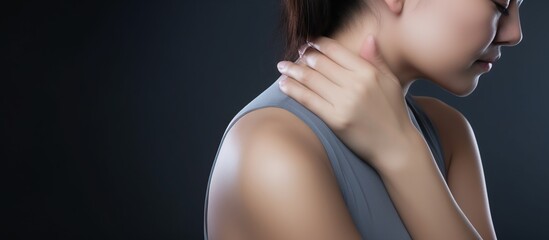 The woman suffers from pain in the neck joints - obrazy, fototapety, plakaty