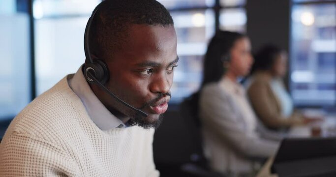 Telemarketing, customer support and man consultant in the office doing online crm consultation. Contact us, headset and professional African male technical service agent working in modern workplace.