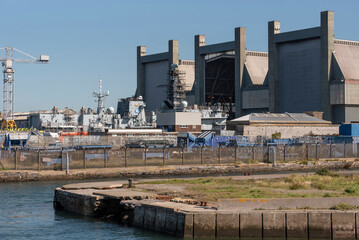 Plymouth, Devon, England, UK.  06. 09. 2023.  Navy ship in for repair at the largest navy repair...