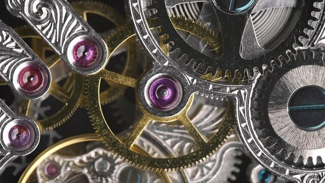 The Intricate Heart of Time: A Macro View of an Antique Pocket Watch's Working Mechanism on Gray