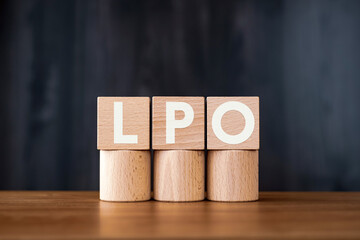 There is wood cube with the word LPO. It is an abbreviation for Landing Page Optimization as eye-catching image.