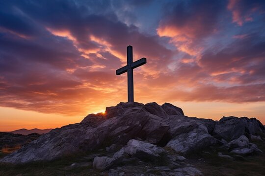 The composition of the image is perfectly balanced, with the cross centered in the frame and the vibrant sky surrounding it.
