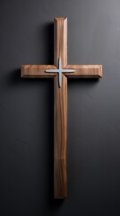The bold design of a wooden cross carving, with strong, clean lines and precise angles.
