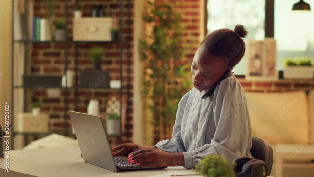 Poster teleworker takes phone call while working on blog articles at home, talking to editor to solve some 