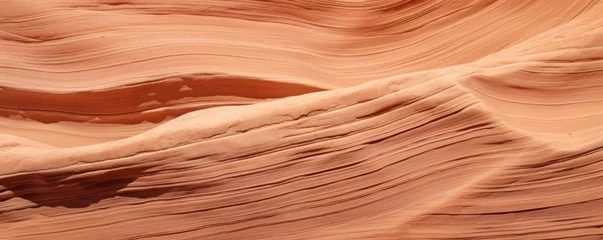Fotobehang A detailed view of sandstone with deep ripple patterns, resembling the carved grooves of a canyon wall. The stones surface has a sculpted, almost sculptural quality to it. © Justlight