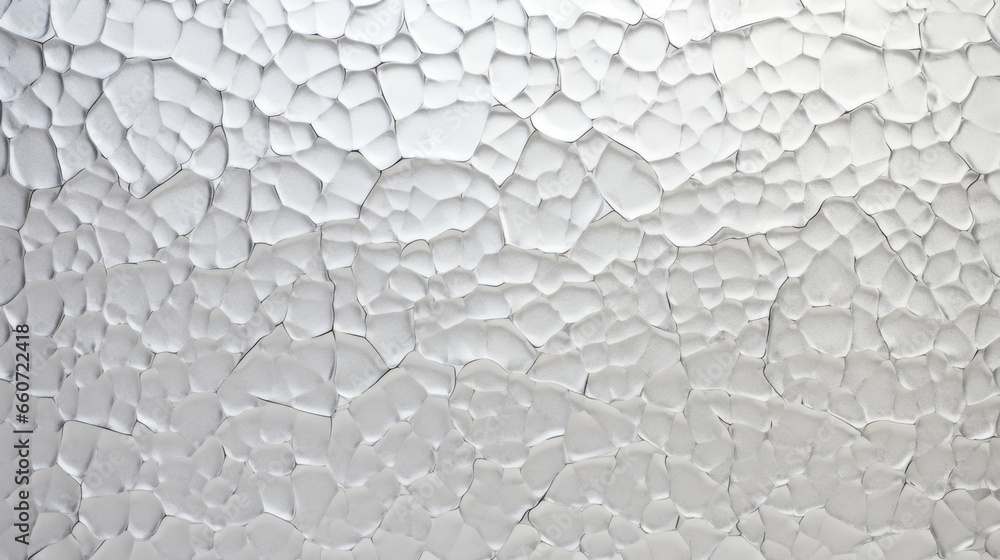 Aufkleber texture of a shimmering silver metal with a hammered pattern. the surface is irregular and catches t