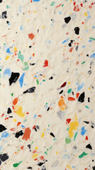 Texture of a speckled opaque plastic, reminiscent of granite or stone. The plastic is solid and rough to the touch, with small flecks of different colors throughout.