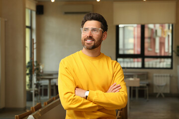 Portrait of handsome stylish man in cafe