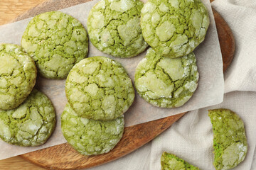 Tasty matcha cookies on table, flat lay