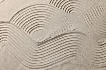 Beautiful patterns on sand, top view. Zen garden