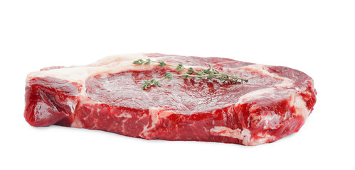 Piece of fresh beef meat and thyme isolated on white
