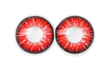 Two red contact lenses isolated on white, top view