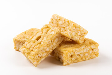 Chinese traditional dessert caramel treats or sachima isolated on white background.