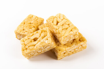 Chinese traditional dessert caramel treats or sachima isolated on white background.