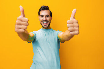 Gesture man style yellow arm studio laughing smiling lifestyle trendy background fashion portrait copy space