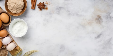 A top-view flat lay presenting essential baking ingredients - flour, eggs, and sugar - neatly arranged on a kitchen counter, with ample empty space for text or additional design elements. - obrazy, fototapety, plakaty