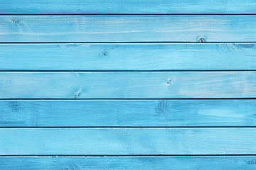 Tuinposter Horizontal blue wood background. Green paint wood texture. Vibrant color plank. Blue color impregnated wood pattern. Bright backdrop. Outdoor woden long stripes. Natural lines pattern. © Paweł Michałowski