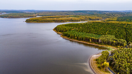 Obraz premium The scenery of Jingyuetan National Forest Park in Changchun, China in early autumn