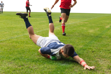 Digital png photo of goalkeeper catching ball during game on transparent background
