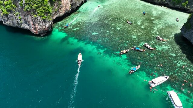 boat sailing in phi phi island in thailand