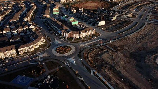 A traffic circle in the Yorkville community during sunset.