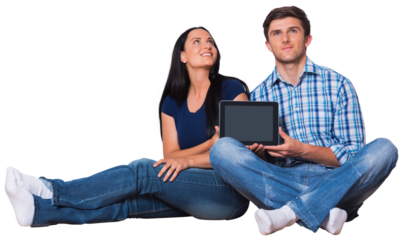 Digital png photo of happy caucasian couple with tablet on transparent background