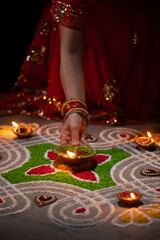 Clay diya lamps lit during diwali celebration, Diwali, or Deepavali, is India's biggest and most important holiday.
