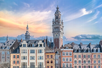 Fototapeta na wymiar Lille, ancient houses in the center, and the belfry of the Chambre de Commerce 