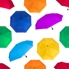 Seamless pattern of different colors colorful umbrellas isolated on white background