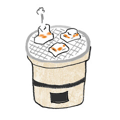 お餅を網に乗せてしちりんの炭で焼く