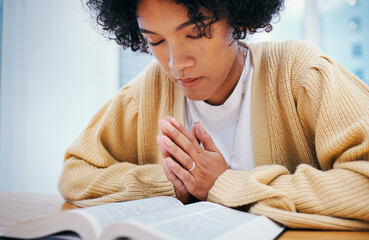 Bible, praying and woman in home for religion, Christian worship or reading to study. Person, holy...