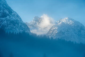 Lake Dobbiaco. Treasure chest among the Dolomites. Winter atmosphere.