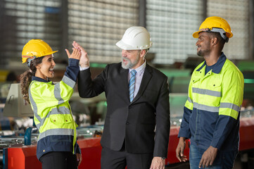 Group of young Engineer United stack hands or join hand teamwork together with Spirit diversity...
