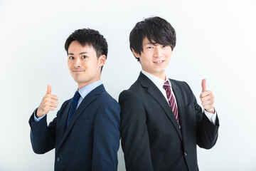 カメラ目線でガッツポーズする男性　Business