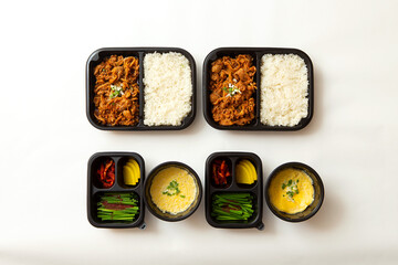 Stir-fried meat and side dishes in packaging containers, Korean food